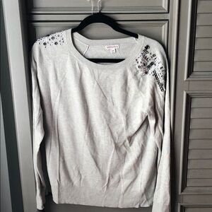 Adorable beige sweater with the gem detail sz L